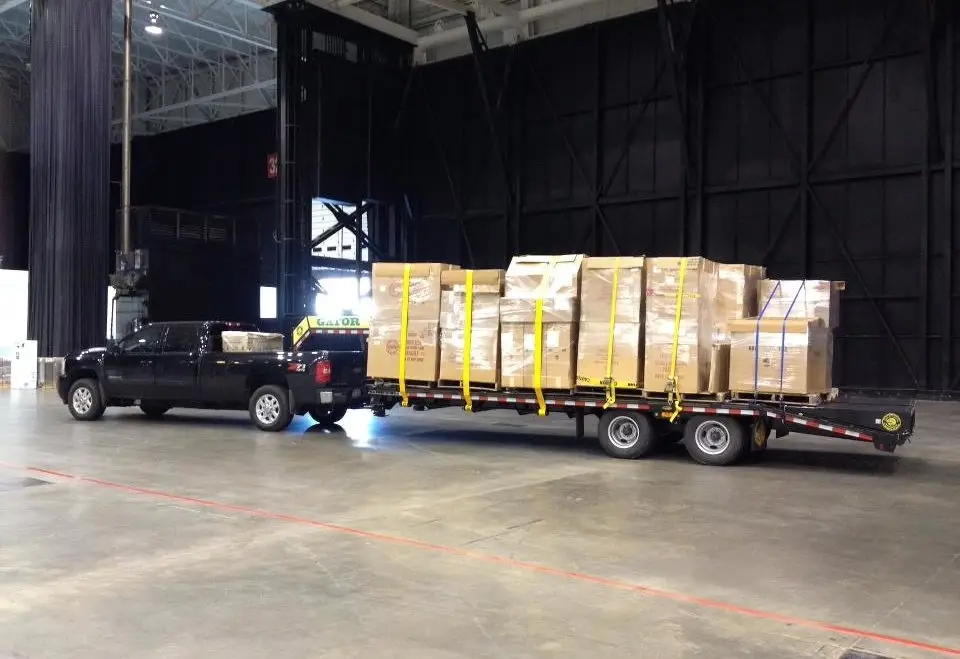 “Palletized freight staged for hotshot pickup inside warehouse.”